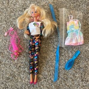 Vintage 1992 Troll Barbie doll with accessories shown in the photos.